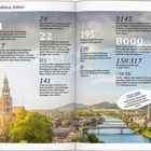 "Zahlen, bitte!" und viele Zahlenfakten über Salzburg vor Fotografie mit Kirchturm, Fluss und Gebäuden in der Landschaft.