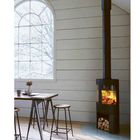 Text: "STANDORT IM HAUS" und "Oben: Wenn Ihr Raum keinen Schornstein hat... beraten." Moderne Einrichtung mit Holzofen.