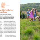 27. Bäuerliche Idylle im Kraichgau. Links ein Text über Weinbau. Rechts ein Hund auf einer Wiese, Kinder im Hintergrund.