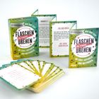 Karten-Set: "Flaschendrehen für Teenager" mit 60 Aufgaben. Verpackung ist bunt, Karten sind in Fächerform ausgelegt.