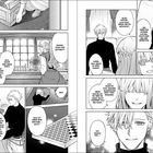 Manga-Seite mit zwei Charakteren in einem Raum. Sie unterhalten sich über das Einrichten eines Arbeitszimmers und räumen Kisten.