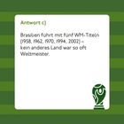 Text: "Antwort c) Brasilien führt mit fünf WM-Titeln (1958, 1962, 1970, 1994, 2002) – kein anderes Land war so oft Weltmeister." Links ein Pokal-Logo.