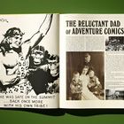 Links: Illustration eines muskulösen Mannes mit Affen, Text: „He was safe on the summit... back once more with his own tribe!“ Rechts: Artikel „The Reluctant Dad of Adventure Comics“ mit Fotos.