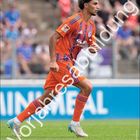 Vorjahresabbildung. Oben rechts der Name Mertcan Ayhan. Kalenderblatt März unten, S04 Logo links. Fußballspieler in Aktion.