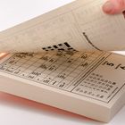 „Rätsel Kalender“. Eine Hand blättert um. Zu sehen ist ein Kreuzworträtsel und das Datum Freitag, 5. Januar, Samstag, 6. Januar.