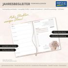 "Jahresbegleiter Terminkalender" und "Mehr Struktur, weniger Stress!". Offenes Buch zeigt Wochenübersicht und Planungsseiten.