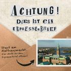 „ACHTUNG! Dies ist ein Erpresserbrief. Start am Rathausmarkt. Hier dürft ihr den Erpresserbrief öffnen!“ Eine Fotografie eines Gebäudes.