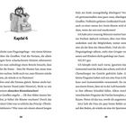 Kapitel 6. Ein Pinguin schaut aus einer Tasche hervor. Text beschreibt einen Zoobesuch, Giraffen und Pinguinfütterung.