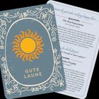 "Wenn du gerade richtig happy bist...", "Gute Laune". Verschnörkelte Karte mit Sonne und floralen Mustern.