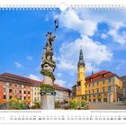 Frühlingshafte Osterstimmung am Marktplatz, Märzkalender mit festlich geschmücktem Rittersäulenbrunnen. Historische Gebäude.