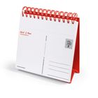 Text: „Hauck & Bauer Postkartenkalender 2021“. Stehender Kalender mit roter Spiralbindung.