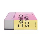 Text: "Denke-schön", "Raban Ruddigkeit". Ein dickes Buch, pinker und gelber Einband, liegt flach auf der Seite.