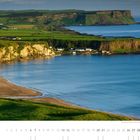 Kalenderblatt mit Küstendorforama. Unten "03". Text: "Whitepark Bay an der nordirischen Antrim Coast, County Antrim".