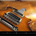 Kalenderblatt März, eine E-Gitarre in Nahaufnahme mit einem verschwommenen, warmen Hintergrund.