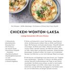 CHICKEN-WONTON-LAKSA: Cremige Kokosbrühe trifft zarte Wonton. Zwei Schalen mit Wonton in gelber Brühe, garniert mit Sprossen.