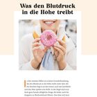 „Was den Blutdruck in die Höhe treibt“ steht oben. Darunter hält eine Person einen rosa Donut vor ihrem Gesicht.