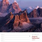 Text: "35. Woche", "August/September 2027", "Blick auf den Lagazuoi (2.835 m) - Dolomiten - Belluno - Italien".  
Bild: Rötlich beleuchtete Berglandschaft bei Sonnenuntergang.