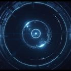 Futuristische, kreisförmige Struktur mit leuchtenden blauen Lichtringen, die zentral angeordnet sind.