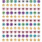 Eine Anordnung aus goldenen Sternen, rosa Herzen und runden Steinen in verschiedenen Farben.