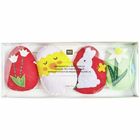 Text: "ANHÄNGER FILZ-OSTEREIER 2D" und "HANGING FELT EASTER EGG 2D". Vier bunte Filz-Ostereier mit Tier- und Pflanzendesigns.