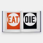 Links steht "EAT" auf Rot, rechts "DIE" auf Schwarz. Beide Texte sind innerhalb eines weißen Kreises.