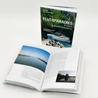 "FLUSSPARADIES Friaul Julisch Venetien" steht auf dem Buchumschlag. Zwei Bücher, eines aufgeschlagen mit Naturfotos.
