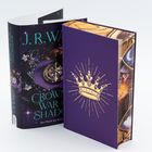 Text: "J.R. Ward, Crown of War and Shadow, Der Fluch der Könige." Abgebildet sind ein Buchcover mit Krone und dekorative Details.