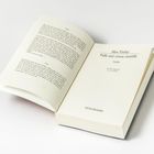 Text: "Alex Finlay - Falls mir etwas zustößt - Thriller". 
Offenes Buch auf hellem Hintergrund.
