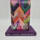 Covertext: "Sibylle Anderl", "Was wir gewinnen, wenn wir uns etwas zumuten", "Bequeme neue Welt", "Piper". Buntes geometrisches Muster.