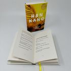 Gelbes Buchcover mit "Nobelpreis für Literatur" und "HAN KANG" samt geöffnetem Buch mit gelbem Lesebändchen.