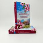 Auf dem Buchcover steht: "Eva-Maria Bast, Das Mandelblütengeheimnis". Es zeigt blühende Mandelzweige.