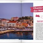 **Chania und der Westen**: Stadtansicht von Chania bei Dämmerung mit Hafen, bunten Häusern und belebter Uferpromenade.