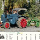 APRIL 2027. LANZ BULLDOG D 5006 A HALBDIESEL. Bild: Alter Traktor mit landwirtschaftlichem Gerät vor herbstlicher Kulisse.