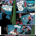 Einige Personen in bunten Kostümen sitzen und diskutieren an einem futuristischen Tisch. Eine Frau schreit.