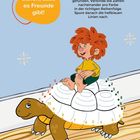 Eine orange Sprechblase sagt: "Schön, dass es Freunde gibt!" Ein rothaari‍ges Kind sitzt lachend auf einer Schildkröte.