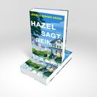 Text: "Jessica Berger Gross, Hazel sagt nein, Roman, Lübbe." Ein Buch mit blauem Cover und einem Haus in ländlicher Umgebung.