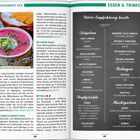 Seite mit Restaurantbeschreibungen und Menü. Links: Foto von rosa Suppe. Rechts: Empfehlungen wie Tatar, Dorschfilet.