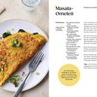 "Masala-Omelett" Rezept mit Zutaten wie Eier, Tomate, Spinat, Curry und Limetten. Gelbes Oval: "Eier sind wahre Kraftpakete."