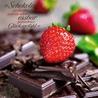 „Schokolade ist fassbar; greifbar und vor allem essbar gewordenes Glücksgefühl.“ Erdbeere auf Schokolade, April-Kalender.