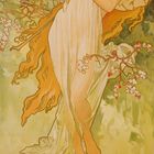 Text: „Alfons Mucha (1860-1939) Der Frühling, 1896: Aus dem Zyklus ‚Die vier Jahreszeiten‘.“

Illustration: Frau mit Blumenkranz, spielt Harfe.