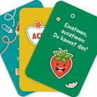 Text: "Einatmen, ausatmen: Du kannst das!" 
Illustration: Drei Karten, eine mit einem lächelnden Erdbeer-Emoji.