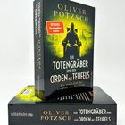 "Der Totengräber und der Orden des Teufels" von Oliver Pötzsch, mit einem gelben Kapuzenfigur-Design.