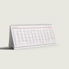 Tischkalender mit Aufschrift "Jahresübersicht 2027". Darunter Monats- und Tagesübersicht mit schlichter Spiralbindung.