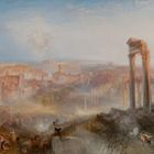 Keine Texte. Eine Landschaft mit Ruinen im Vordergrund, klarer Himmel, Gebäude in der Ferne, Tiere und Menschen im Vorgrund.