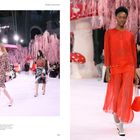 Texte: "Models glide through a surreal, candy-colored woodland", "BEHIND THE RUNWAY", "CHANEL Haute Couture Spring-Summer 2020".

Szene: Modekollektion vor rosa Bäumen, Models in eleganter Kleidung.