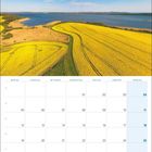 Kalender für Mai 2027, oben Landschaft mit gelben Feldern, blauem Himmel und einem Gewässer.