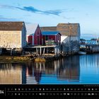 Kalenderseite mit dem Text: "Der Atlantik formt stille Buchten voller wilder Schönheit". 
Häuser am Wasser in Kanada.