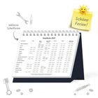 "Schöne Ferien!" steht auf einem gelben Post-it mit Sonnengesicht. Kalender zeigt Schulferien 2027 in Deutschland.