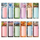 Ein Kalender mit zwölf Monatsblättern; oben jeweils ein Bild, unten ein Planer.