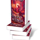 Ein Stapel Bücher mit dem Titel „The Wind Weaver - Sturmverführt“ von Julie Johnson, darüber ein roter Phönix.